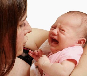 Crying baby and mum